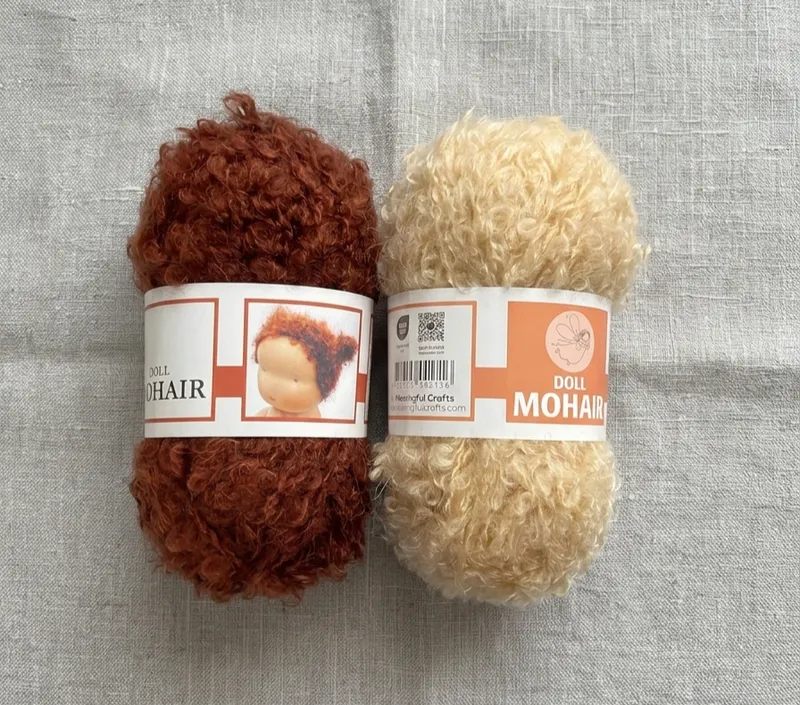 Handmade doll with curly mohair bouclé hair
